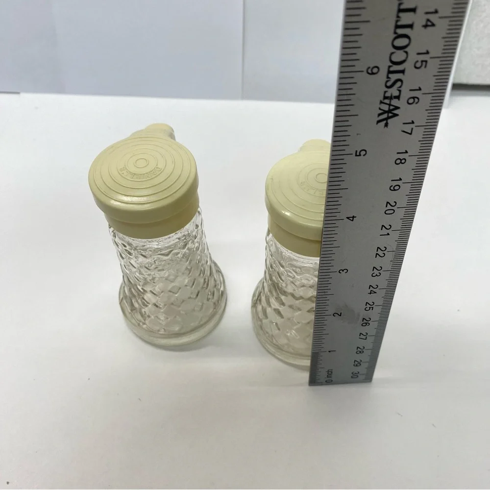 Vintage Daniells Salt and Pepper Shakers Set Beige Top Glass Bottom Plastic Tops